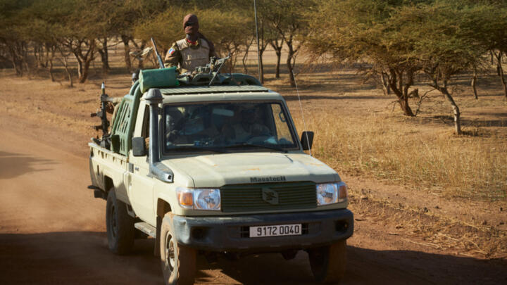 A vehicle of the Burkina Faso Army patrols a rural area in the Soum region in northern Burkina Faso on November 14, 2019.